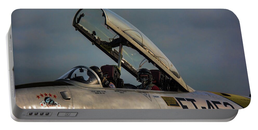 Lockeed Portable Battery Charger featuring the photograph Preparing For Takeoff - Lockeed Canadair CT-133 by John Black