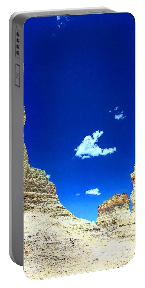 Kansas Portable Battery Charger featuring the photograph Pristine Sky Meets Historic Rocks by Michael Oceanofwisdom Bidwell