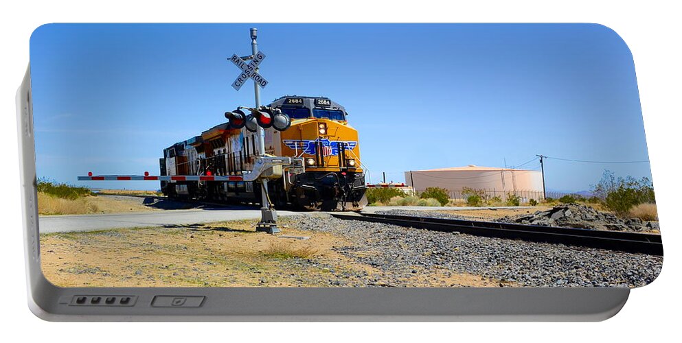 Railway Crossing; Railroad Crossing; Train Crossing; Union Pacific; Freight Train; Yellow; Blue; Green; Red; Water Storage; Train Tracks; Train Signal; Mojave Desert; Mohave Desert; Antelope Valley; Joe Lach Portable Battery Charger featuring the photograph Railway Crossing by Joe Lach
