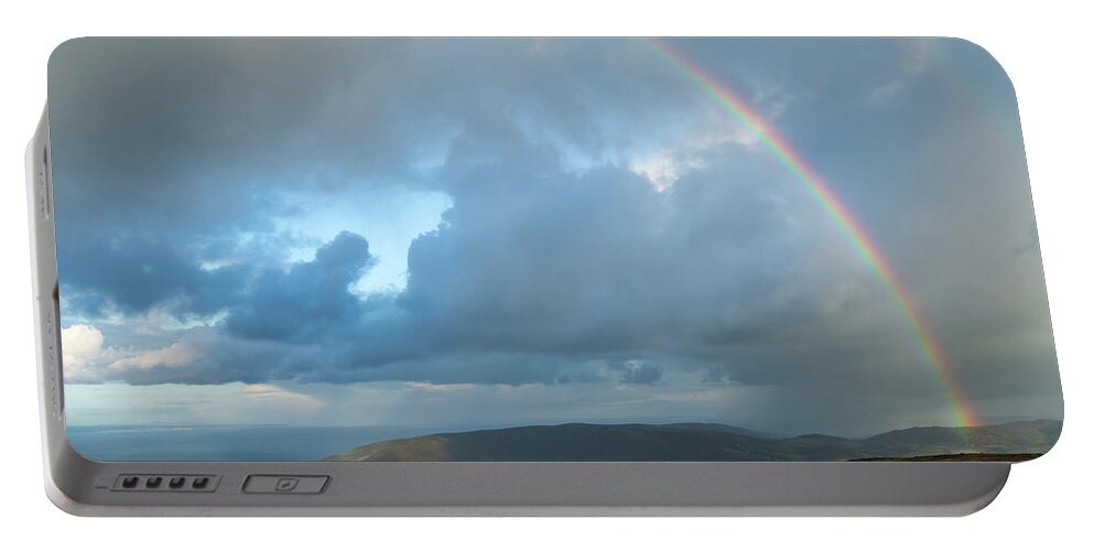 Rainbow Portable Battery Charger featuring the photograph Rainbow over Porlock Hill by Andy Myatt