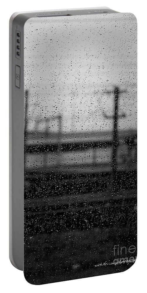Black Portable Battery Charger featuring the photograph Rainy Day Train by Vicki Ferrari