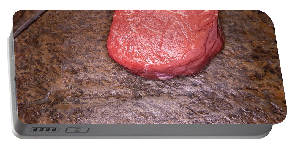 Beef Portable Battery Charger featuring the photograph Raw filet mignon steak on slate by Karen Foley