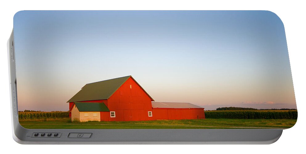 Country Portable Battery Charger featuring the photograph Red Barn and the Moon by Alexey Stiop