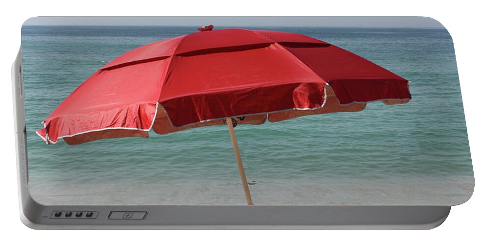 Red Portable Battery Charger featuring the photograph Red Beach Umbrella by Gravityx9 Designs
