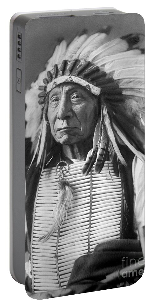 Red Portable Battery Charger featuring the photograph Red Cloud, Dakota Chief, wearing a headdress, 1880s by David Frances Barry