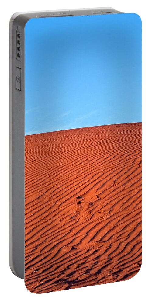 Sand Portable Battery Charger featuring the photograph Red Dirt and Blue Sky by Catherine Reading