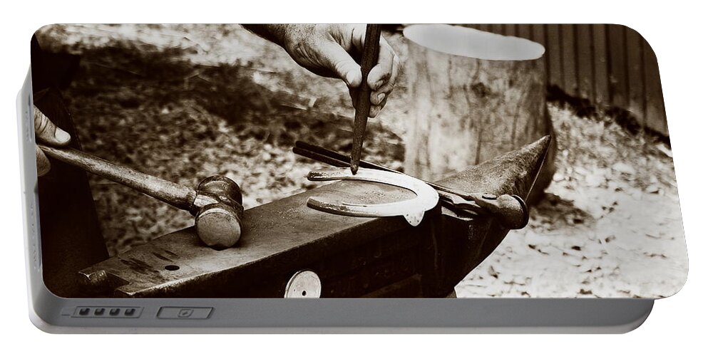 Farrier Portable Battery Charger featuring the photograph Red Hot Horseshoe on Anvil by Angela Rath
