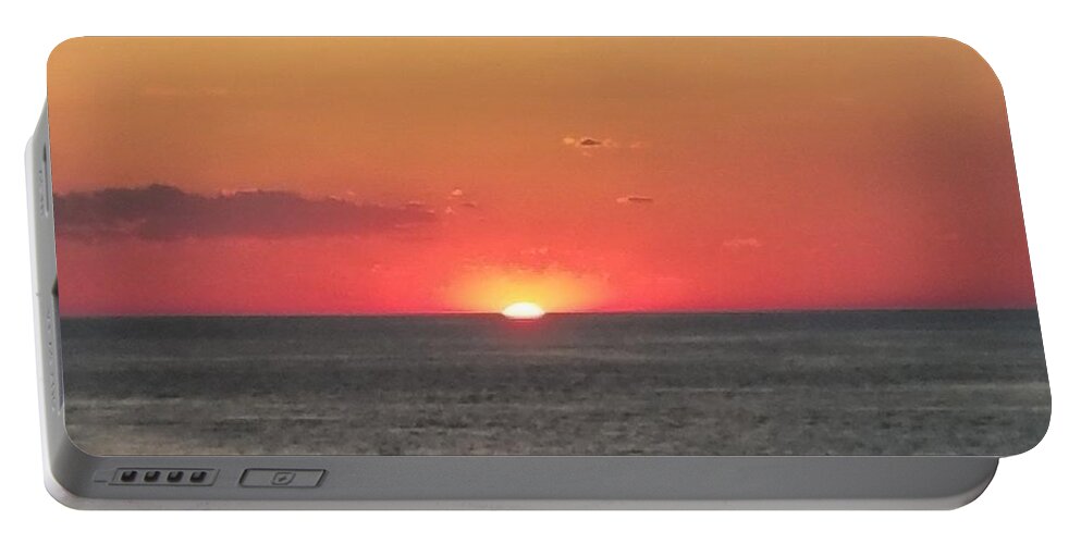 Sunset Portable Battery Charger featuring the photograph Red Sun Sets Over Ocean by Vic Ritchey