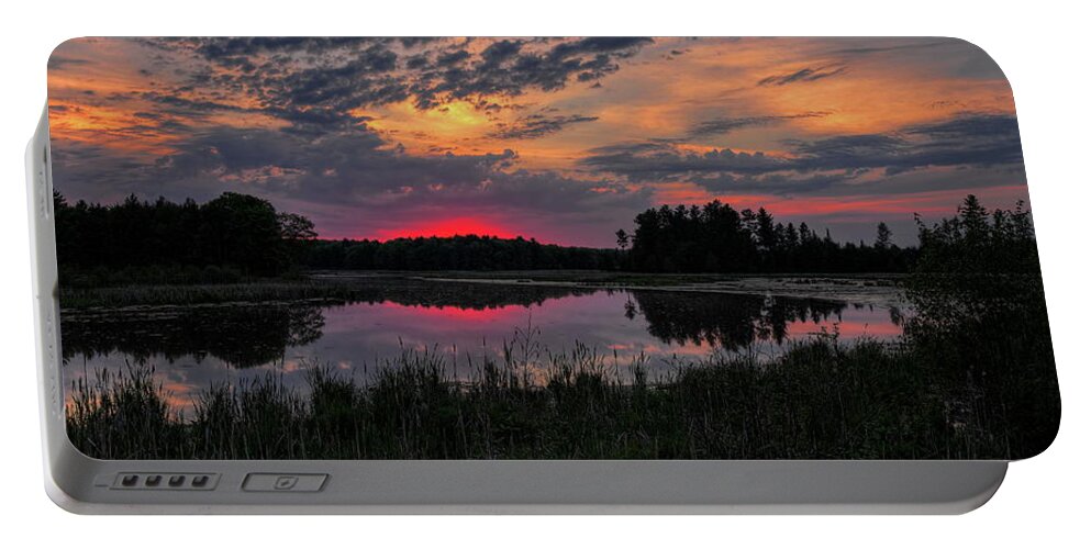 Sunset Portable Battery Charger featuring the photograph Red Sunset Over Bentley Pond by Dale Kauzlaric