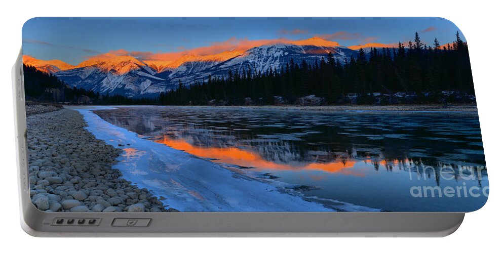 Athabasca River Portable Battery Charger featuring the photograph Red Winter Glow In The Athabasca by Adam Jewell