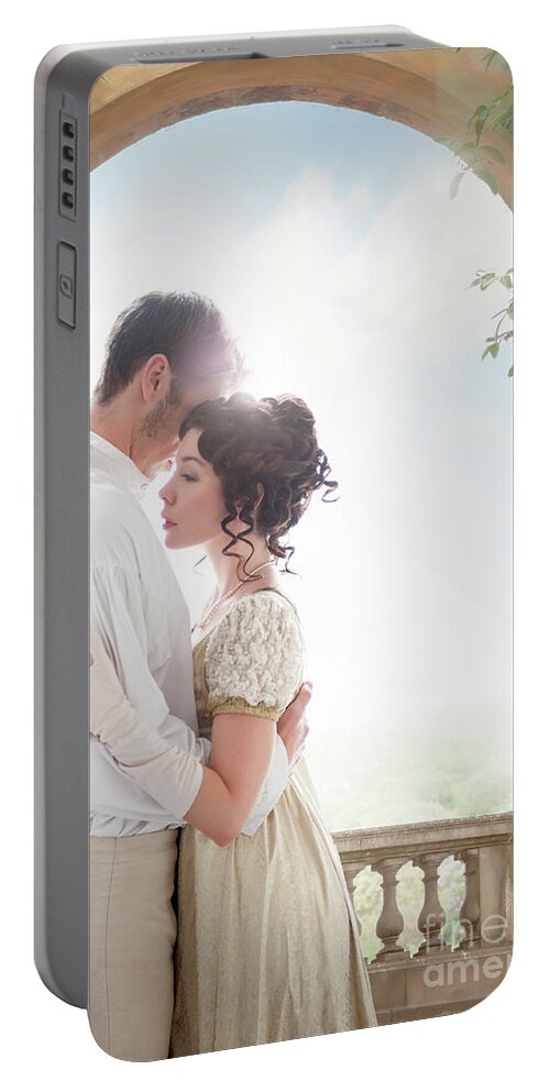 Regency Portable Battery Charger featuring the photograph Regency Couple Embracing Beneath An Archway by Lee Avison