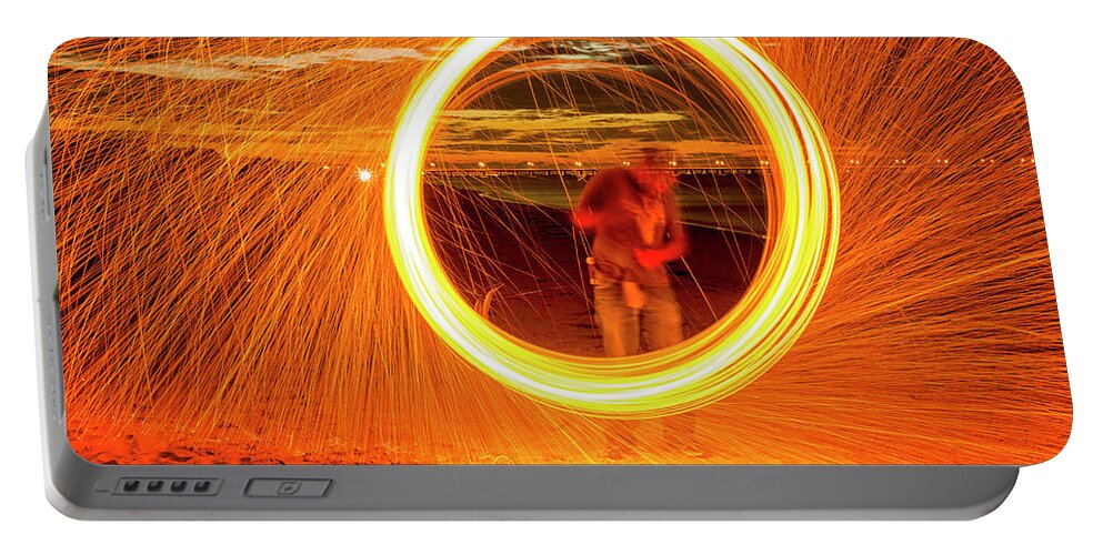 Steel Portable Battery Charger featuring the photograph Ring of Fire by Travis Rogers