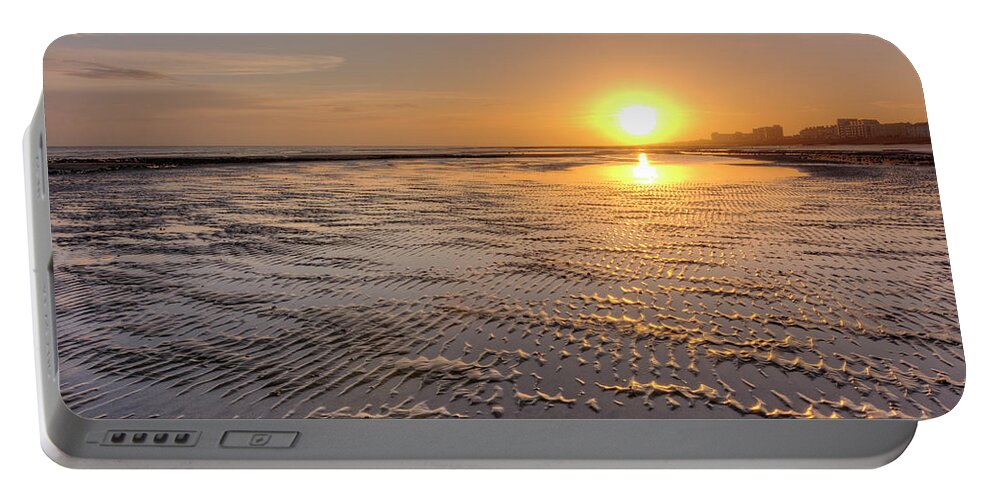 Worthing Portable Battery Charger featuring the photograph Rippled Sunset by Hazy Apple