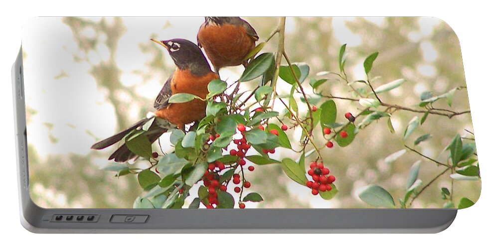 Nature Portable Battery Charger featuring the photograph Robins in Holly by Peggy Urban