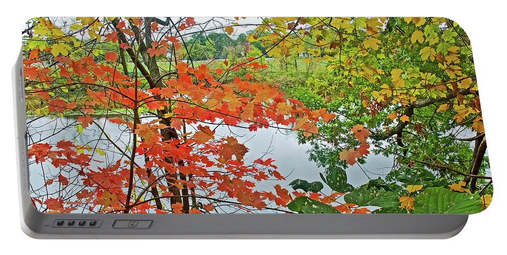 Rogue River Through Autumn Leaves In Rockford Portable Battery Charger featuring the photograph Rogue River through Autumn Leaves in Rockford, Michigan by Ruth Hager