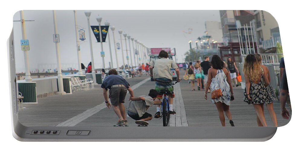 Boardwalk Portable Battery Charger featuring the photograph Rolling Down The Boards by Robert Banach