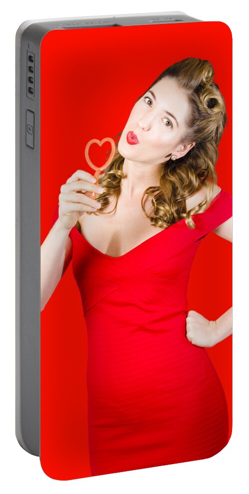 Valentines Day Portable Battery Charger featuring the photograph Romantic blond pin-up lady blowing party bubbles by Jorgo Photography
