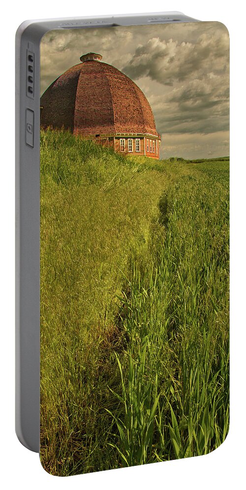 Farm Portable Battery Charger featuring the photograph Round Barn by Bob Cournoyer