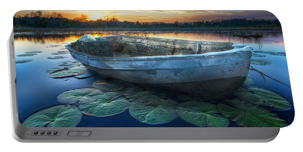 Boats Portable Battery Charger featuring the photograph Rowboat at Sunset by Debra and Dave Vanderlaan