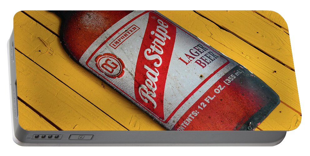 Red Stripe Beer Sign Portable Battery Charger featuring the photograph Red Stripe beer sign by David Lee Thompson