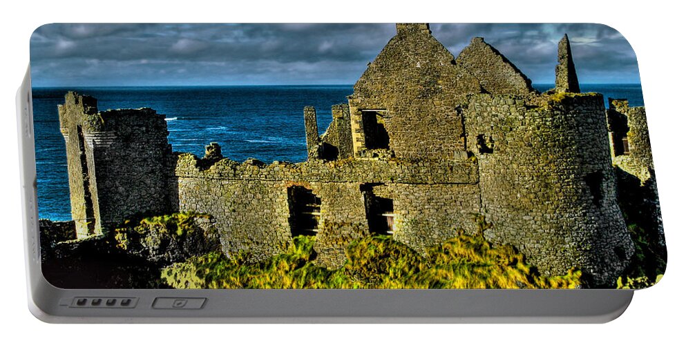 Dunluce Portable Battery Charger featuring the photograph Ruins Of Dunluce Castle by Nina Ficur Feenan