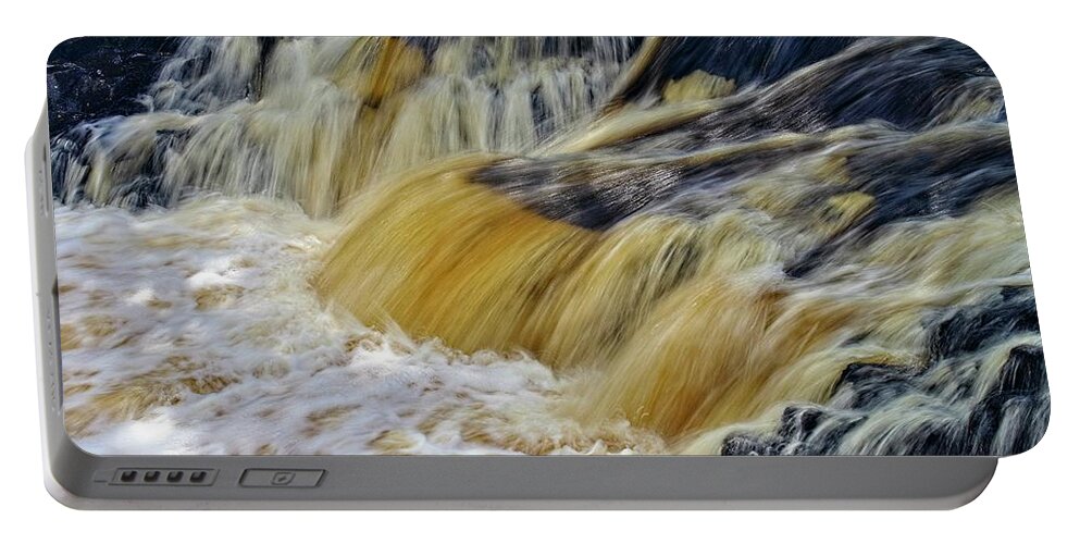 Waterfall Portable Battery Charger featuring the photograph Rushing Water by Martyn Arnold