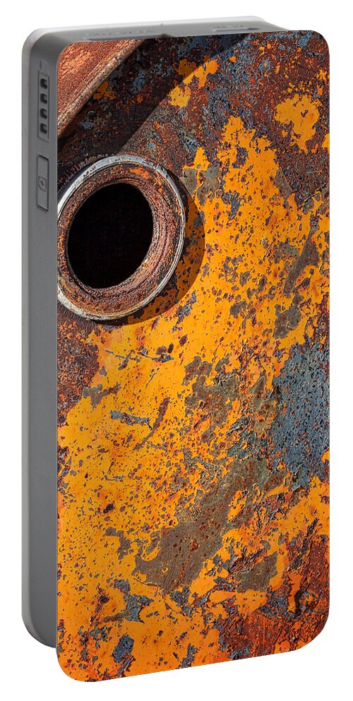 Rust Portable Battery Charger featuring the photograph Rusty Barrel Top by Stuart Litoff