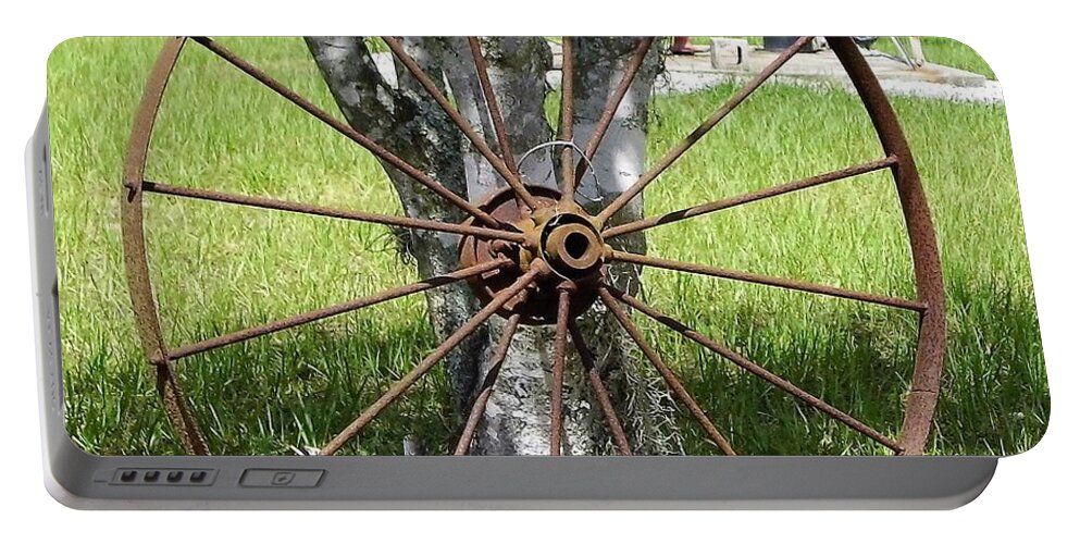 Old Wheel Portable Battery Charger featuring the photograph Rusty Wheel by D Hackett