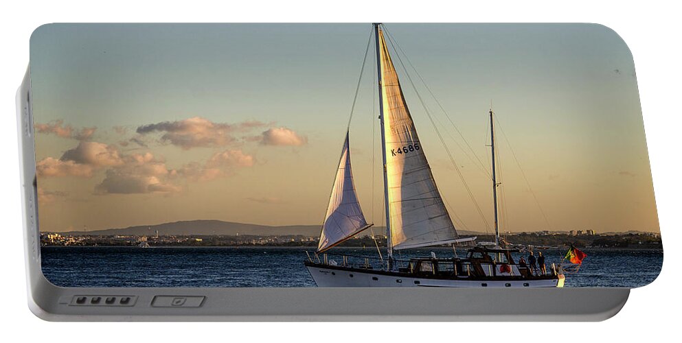 Lisbon Portable Battery Charger featuring the photograph Sail Away from Lisbon by Pablo Lopez