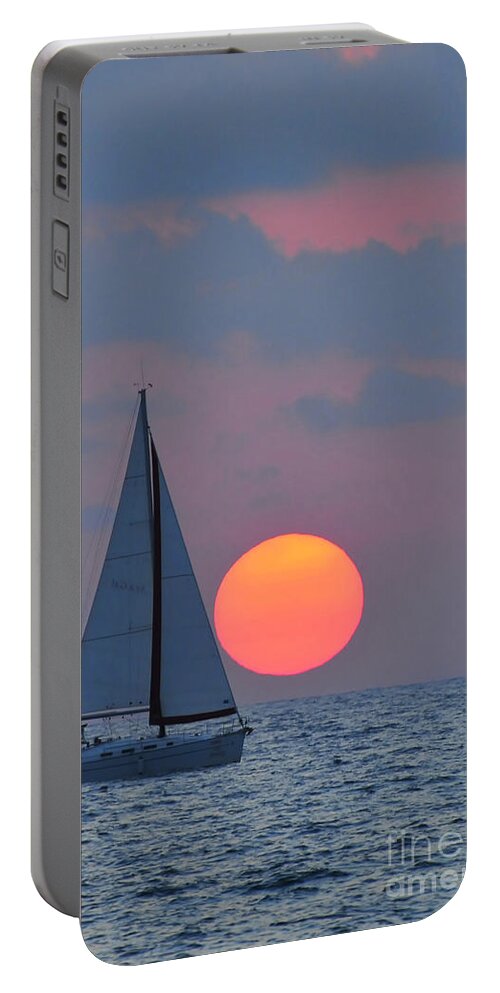 Sail Boats Portable Battery Charger featuring the photograph Sailboat at sunset by Shay Levy