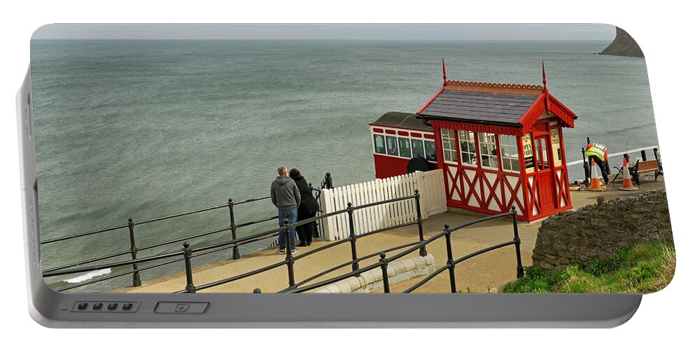 Britain Portable Battery Charger featuring the photograph Saltburn Cliff Tramway - Top Station by Rod Johnson