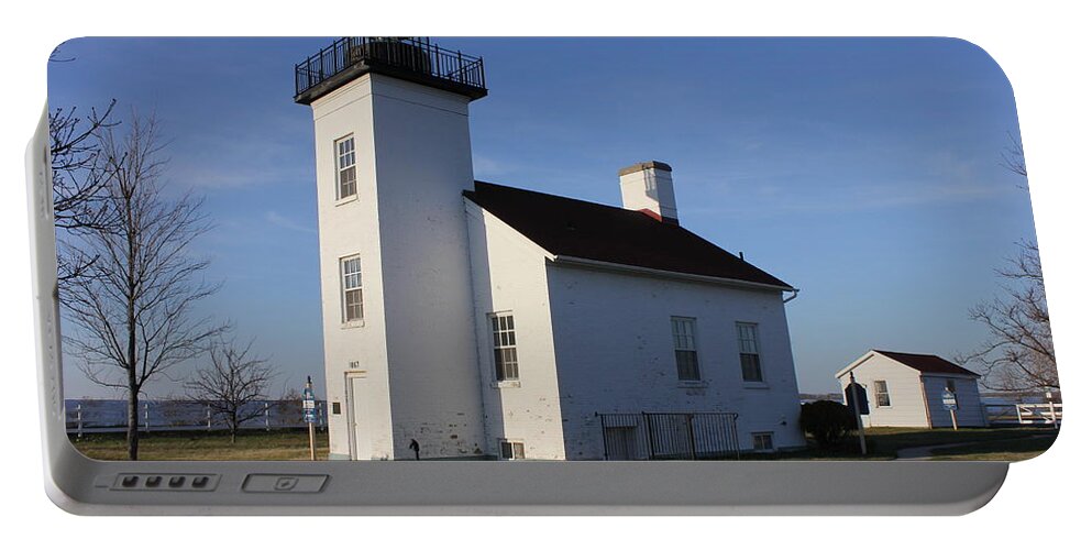 Light Portable Battery Charger featuring the photograph Sand Point lighthouse in Escanaba by Charles and Melisa Morrison