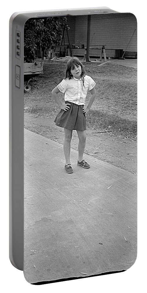 Sassy Portable Battery Charger featuring the photograph Sassy Girl, 1971 by Jeremy Butler