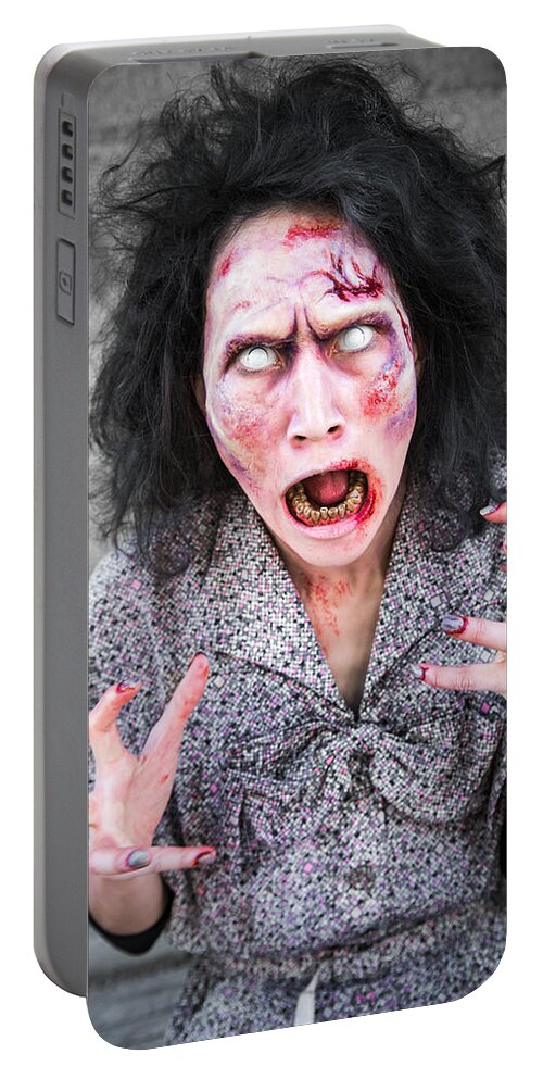 Zombie Portable Battery Charger featuring the photograph Scary screaming zombie woman by Matthias Hauser