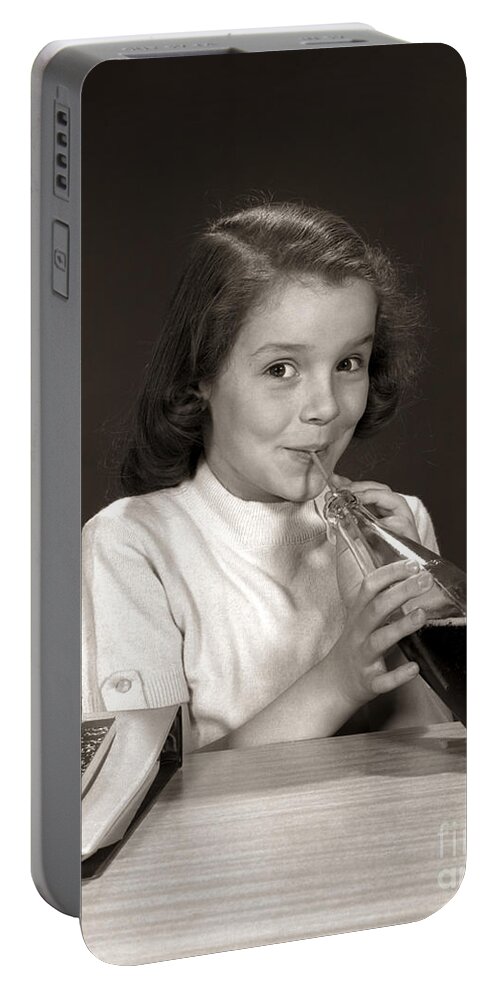 1950s Portable Battery Charger featuring the photograph Schoolgirl Drinking Soda, C.1950-60s by H. Armstrong Roberts/ClassicStock