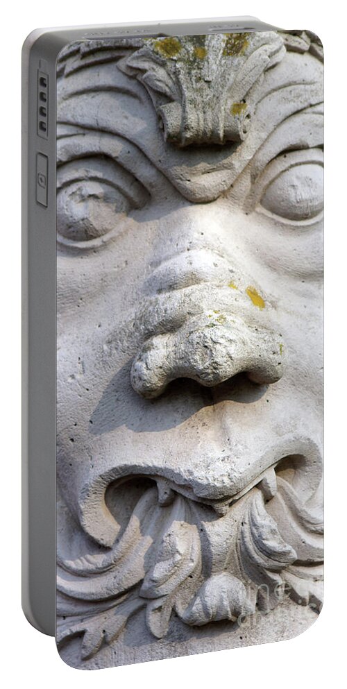 Sculpture Portable Battery Charger featuring the photograph Sculpture at the main entrance of the Corvey monastery by Eva-Maria Di Bella