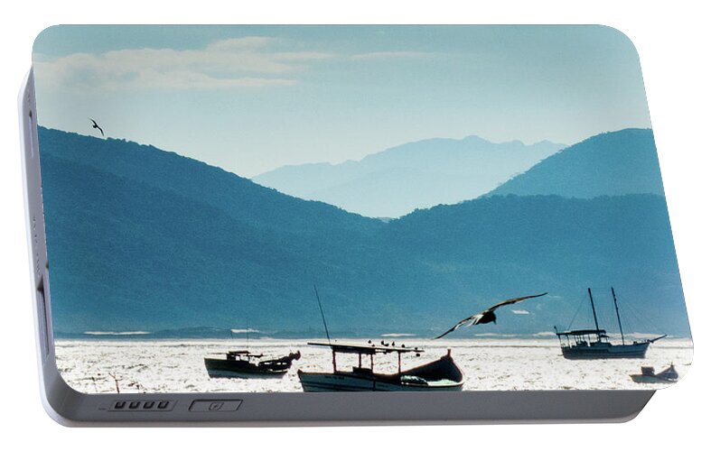 Sea Portable Battery Charger featuring the photograph Sea and Freedom by Martin Lopreiato