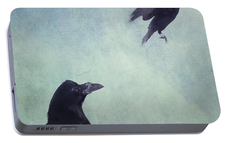 Raven Portable Battery Charger featuring the photograph Set your mind free by Priska Wettstein
