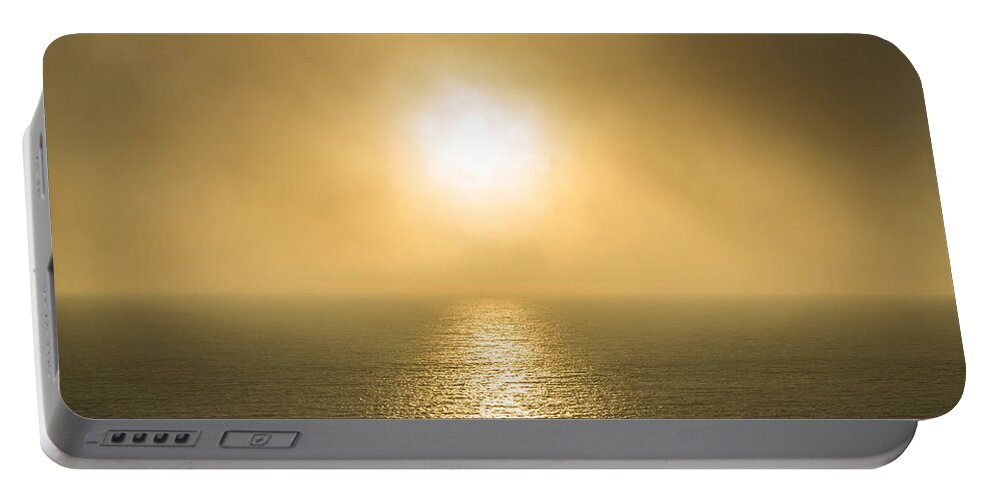 Setting Sun With Fog Portable Battery Charger featuring the photograph Setting Sun with Fog by Bonnie Follett