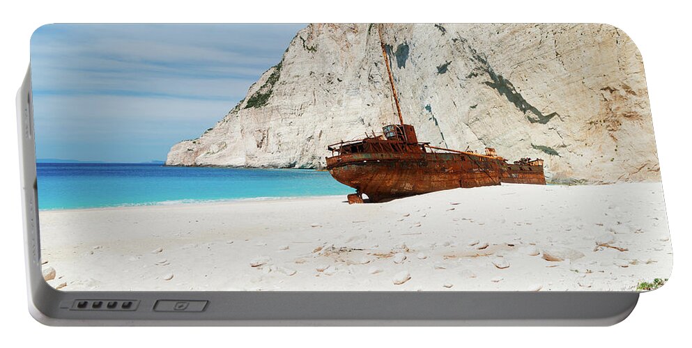 Navagio Portable Battery Charger featuring the photograph Shipwreak Beach II by Anastasy Yarmolovich