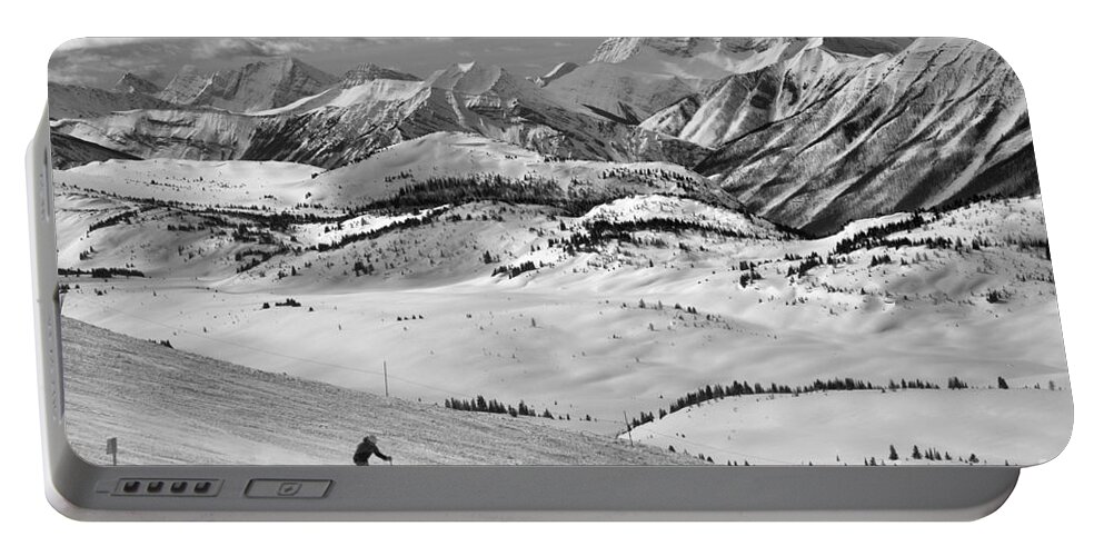 Sunshine Village Portable Battery Charger featuring the photograph Skiing Through The Canadian Rockies Black And White by Adam Jewell
