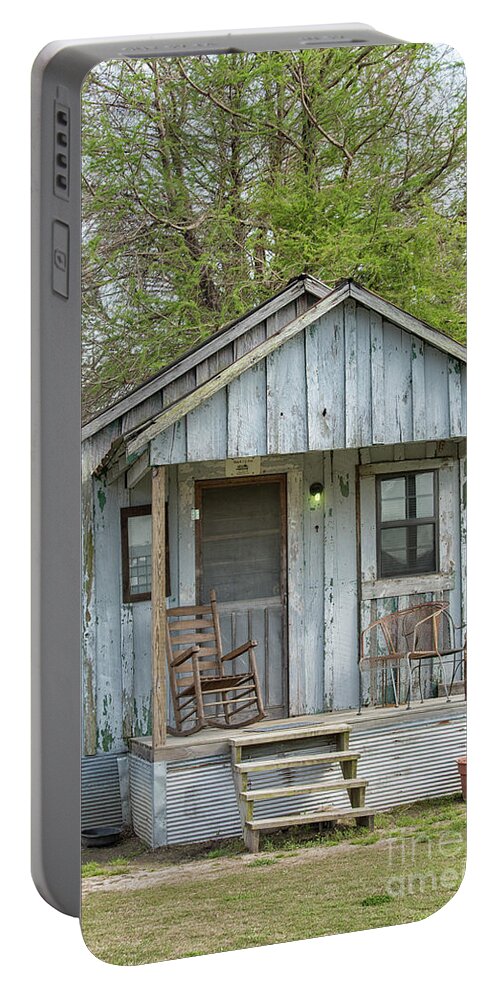 Architecture Portable Battery Charger featuring the photograph Small blue shack in Clarksdale, Mississippi by Patricia Hofmeester