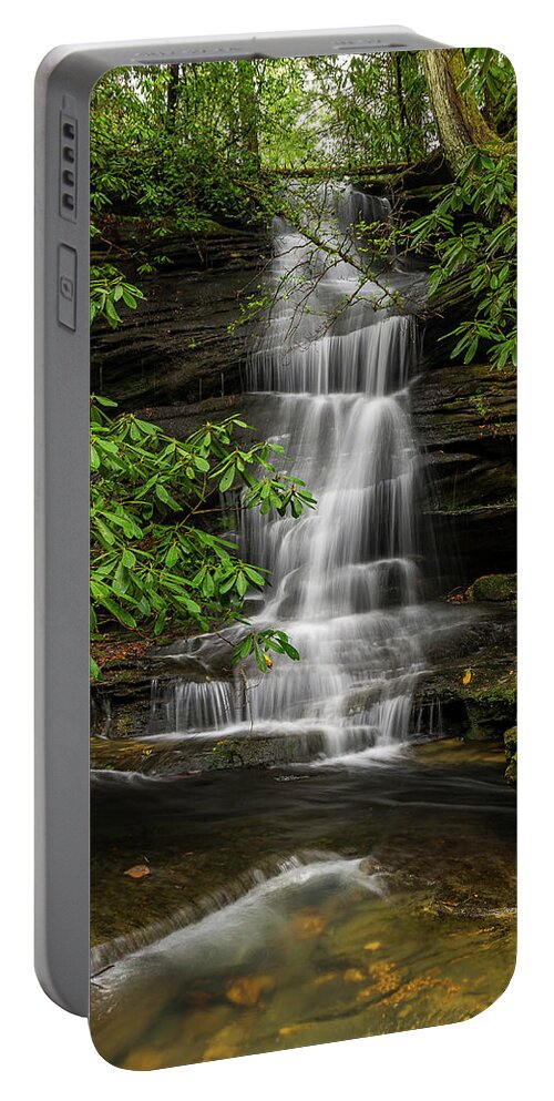 2017-01-15 Portable Battery Charger featuring the photograph Small waterfalls in the forest. by Ulrich Burkhalter