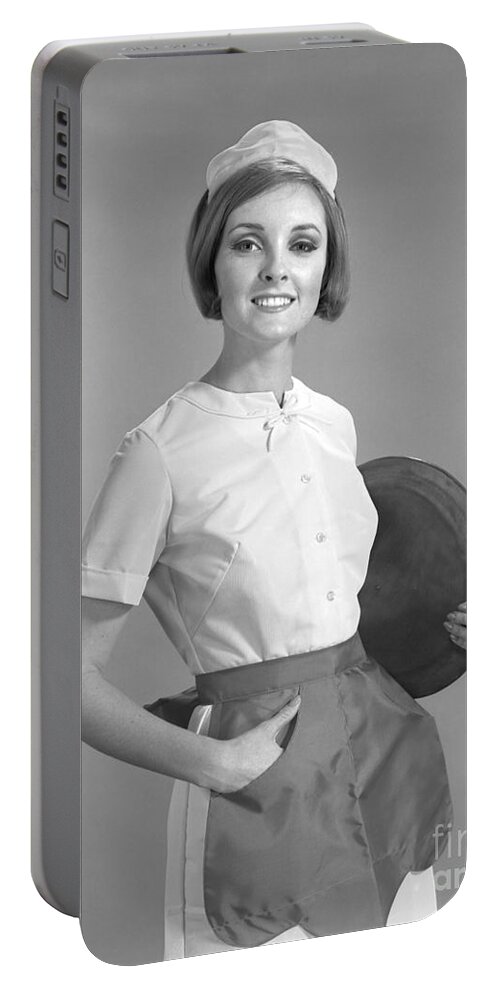 1960s Portable Battery Charger featuring the photograph Smiling Waitress In Uniform, C.1960s by H. Armstrong Roberts/ClassicStock