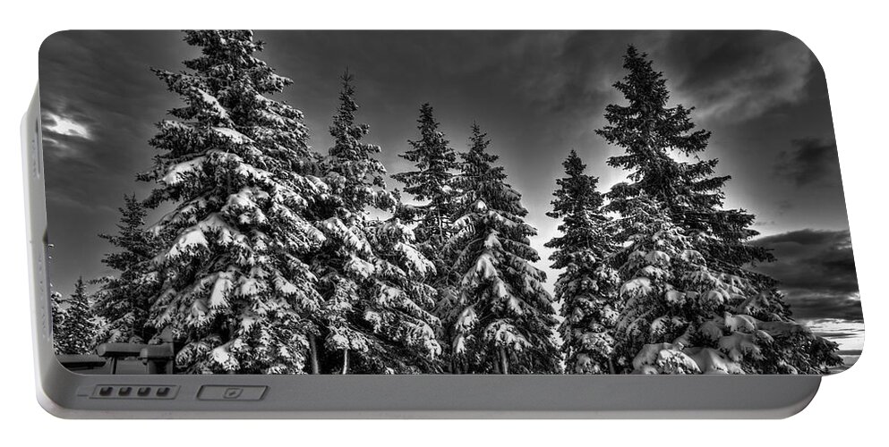 Winter Portable Battery Charger featuring the photograph Snow covered trees bw by Ivan Slosar