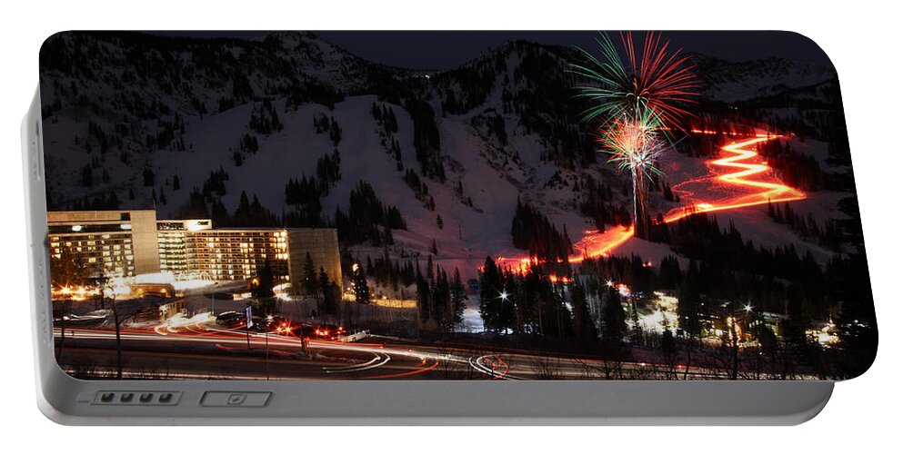 Landscape Portable Battery Charger featuring the photograph Snowbird Torchlight Parade and Firework by Brett Pelletier