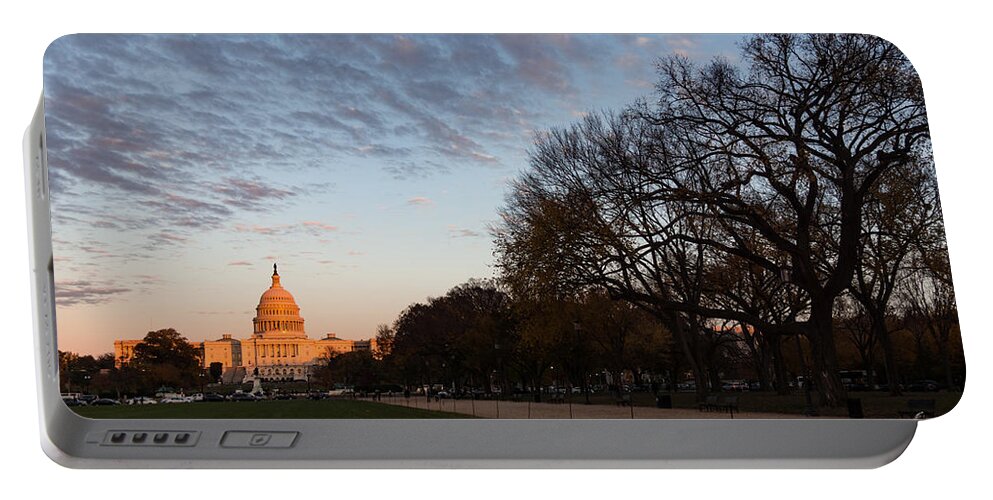 Georgia Mizuleva Portable Battery Charger featuring the photograph Soft Orange Glow - U S Capitol and the National Mall at Sunset by Georgia Mizuleva