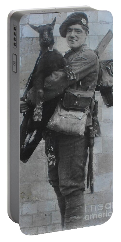 Soldier Portable Battery Charger featuring the photograph Soldier and goat by Therese Alcorn