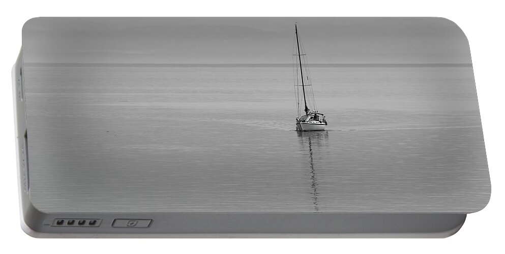 Sail Boat Portable Battery Charger featuring the photograph Solo Sailing by Inge Riis McDonald