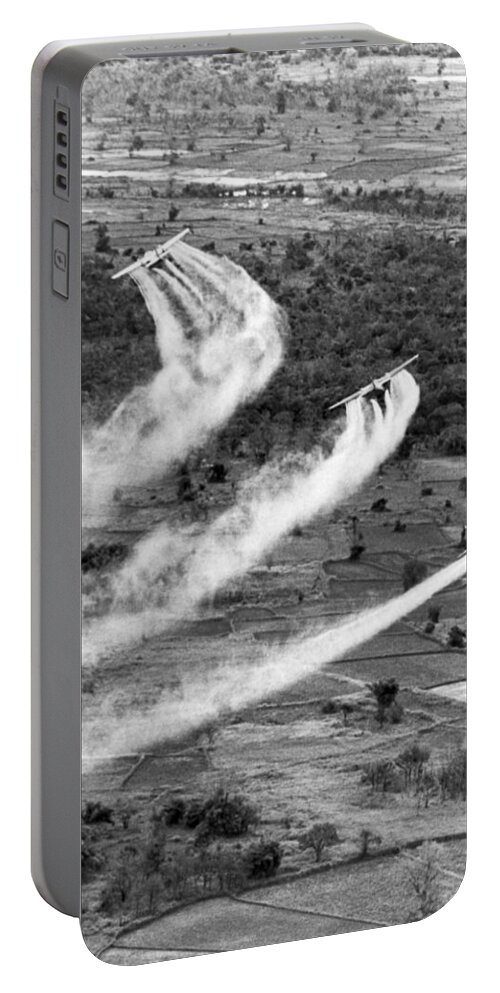 1960s Portable Battery Charger featuring the photograph Spraying Agent Orange by Underwood Archives